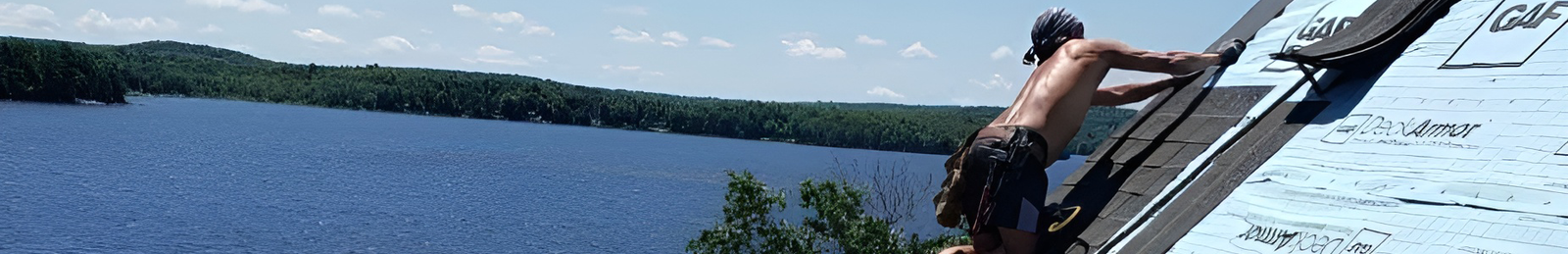Expert Roofing crew working on a lakeside property